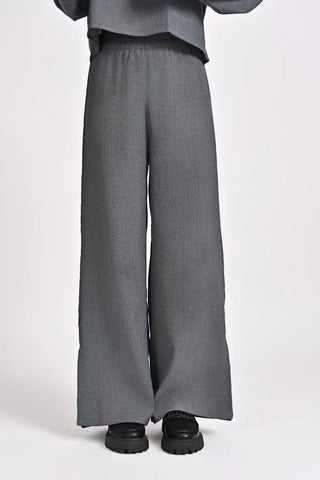 TEXTURED TROUSERS WITH  SLIT